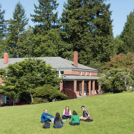 Photo of students sitting on lawn. Link to Gifts That Protect Your Assets.