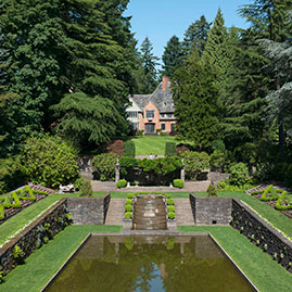 A house surrounded by woods. Links to Beneficiary Designations